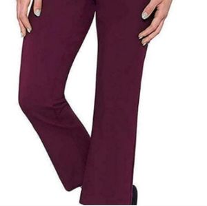 Burgundy form fitted trousers.